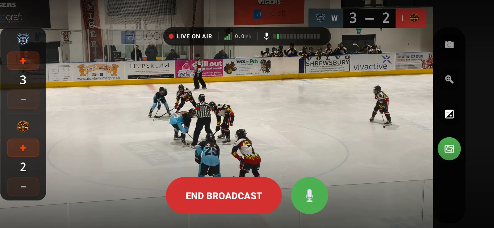 Live streaming view showing GO LIVE button and scoreboard overlay during an active broadcast